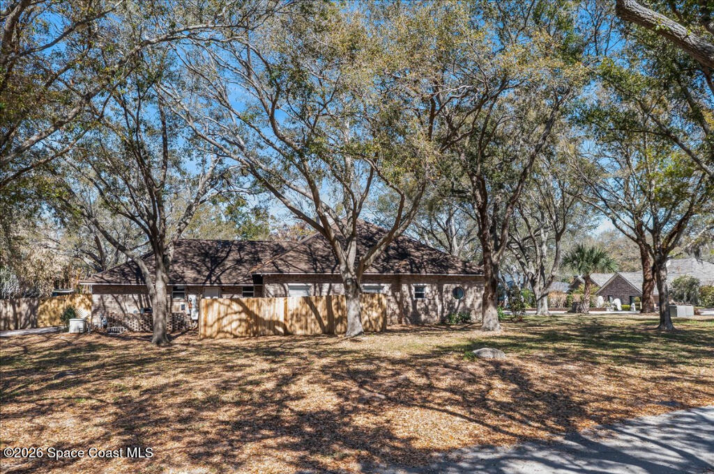 35 River Ridge Drive Rockledge, FL 32955 - Photo 42 of 48 a view of yard with trees