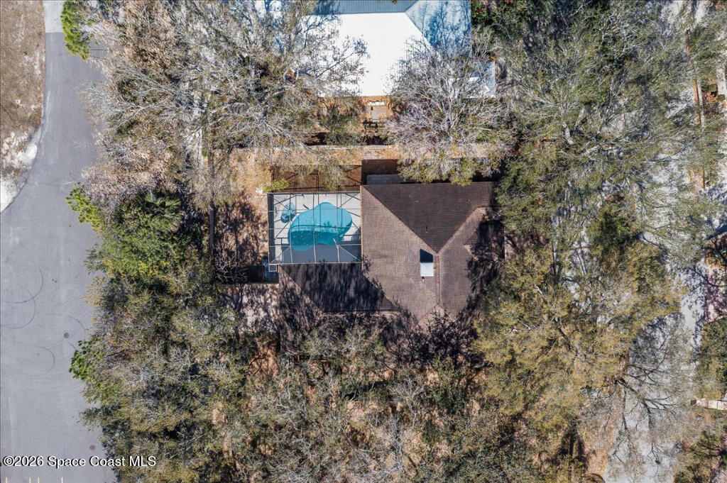 35 River Ridge Drive Rockledge, FL 32955 - Photo 43 of 48 a view of a house with a yard