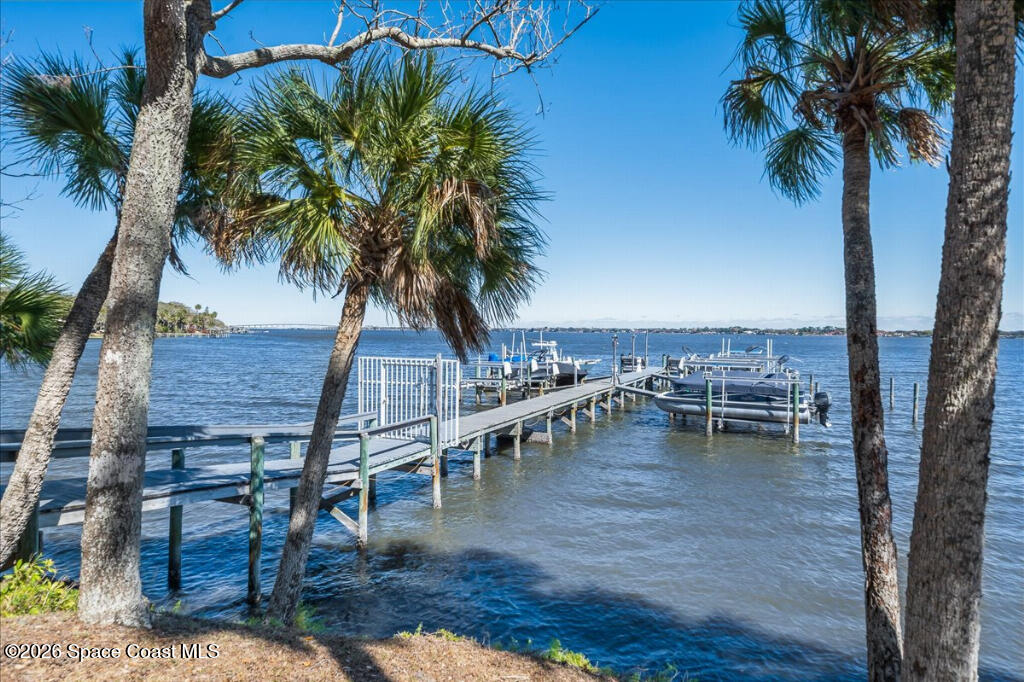 35 River Ridge Drive Rockledge, FL 32955 - Photo 48 of 48 a view of roof deck with dining table and chairs