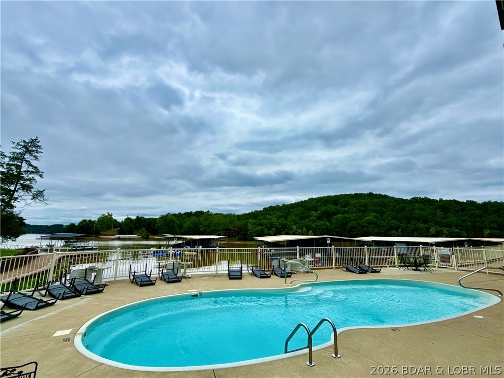 562 Hyd A Way Road, Unit 3E Camdenton, MO 65020 - Photo 29 of 38 Community lakefront pool