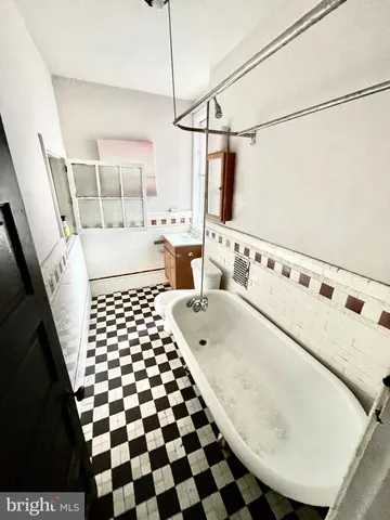 a black and white checkered floor with a black white checkered floor