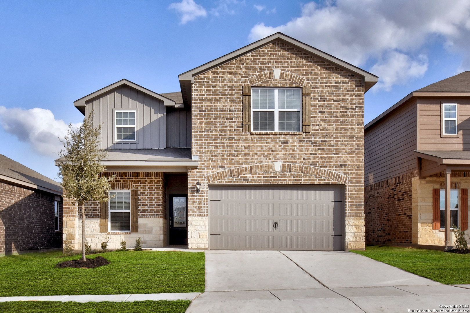 9206 Foxing Bluff Converse, TX 78109 - Photo 1 of 1 a front view of a house with garden