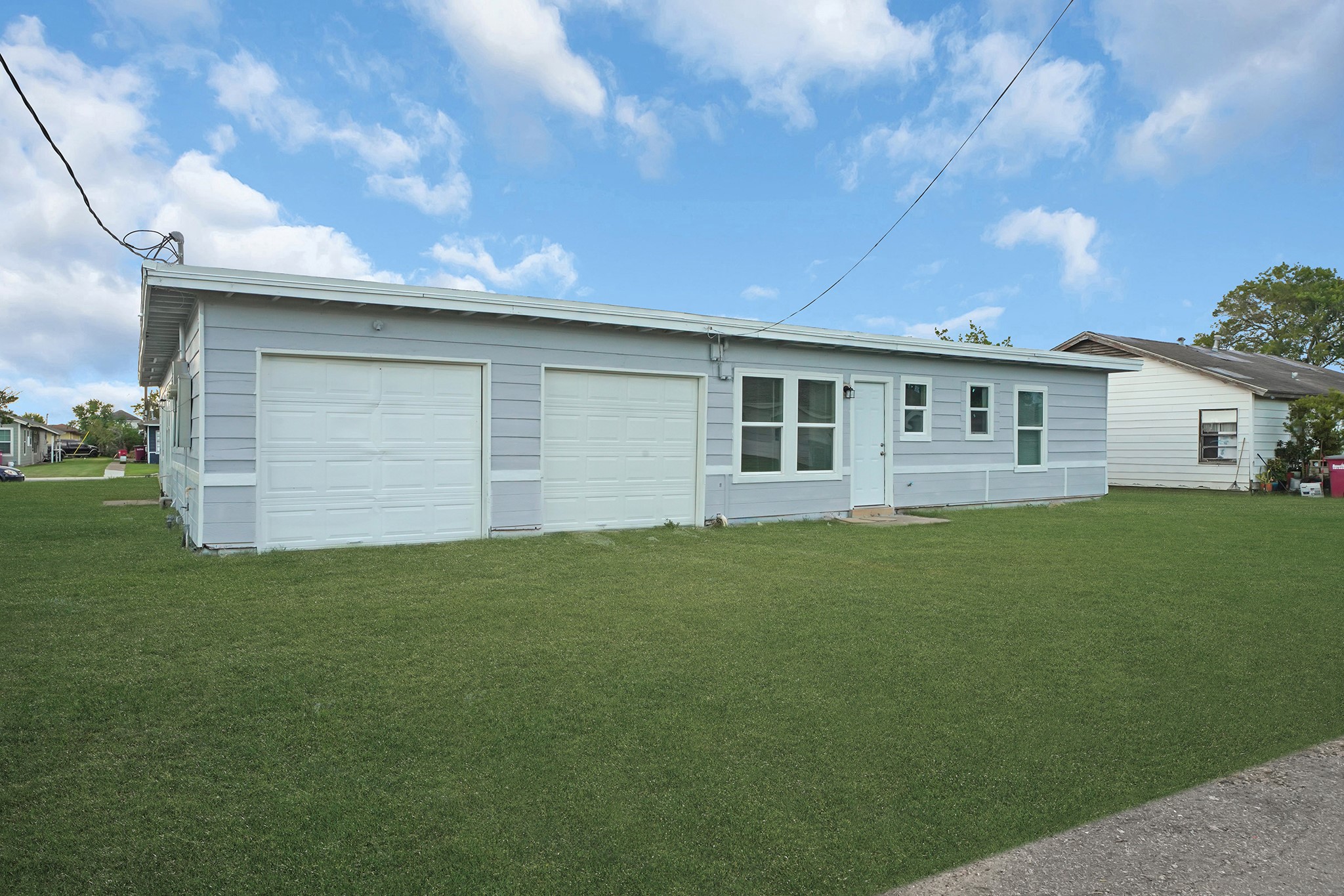 1753 West 6th Street Freeport, TX 77541 - Photo 17 of 20 a backyard of a house with lots of green space