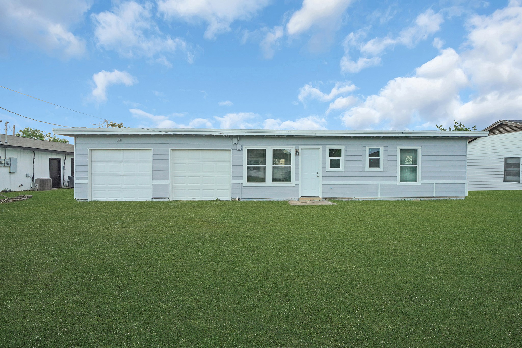 1753 West 6th Street Freeport, TX 77541 - Photo 20 of 20 a view of house with backyard