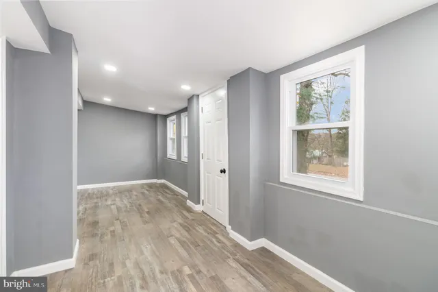 a view of an empty room and window