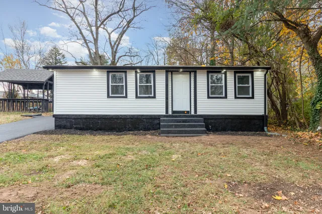 a house view with a garden space