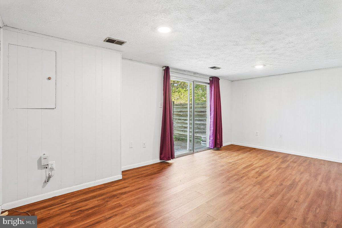 76 Timber Rock Road Gaithersburg, MD 20878 - Photo 40 of 51 a view of an empty room with a window