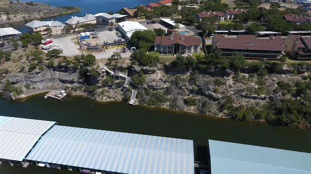 an aerial view of residential house and outdoor space