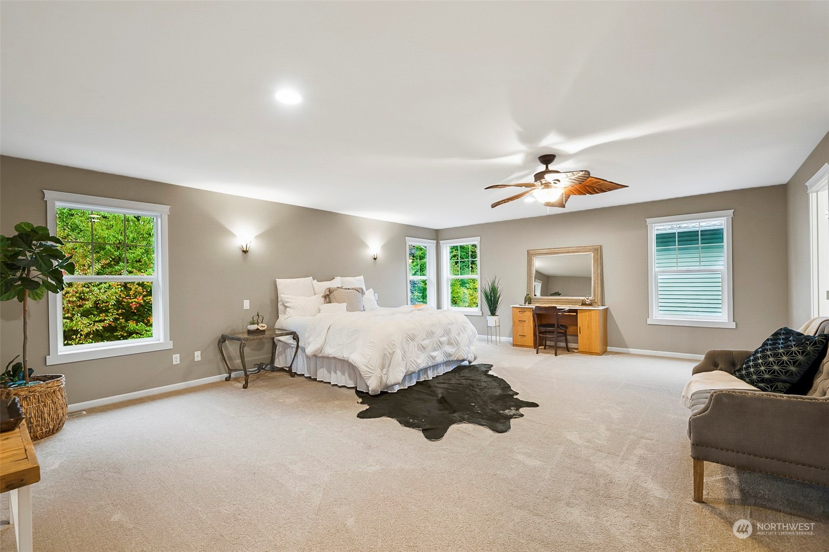 20227 Rustic View Road Southeast Monroe, WA 98272 - Photo 23 of 37 a bed room with a bed and a couch