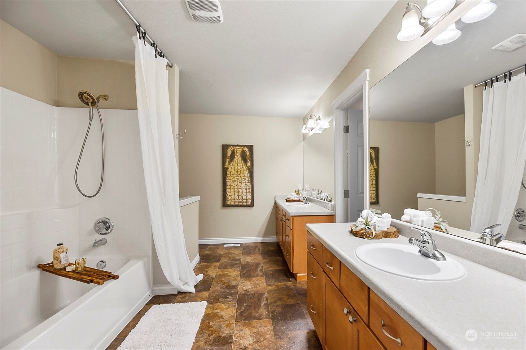 20227 Rustic View Road Southeast Monroe, WA 98272 - Photo 24 of 37 a spacious bathroom with a double vanity sink mirror and double