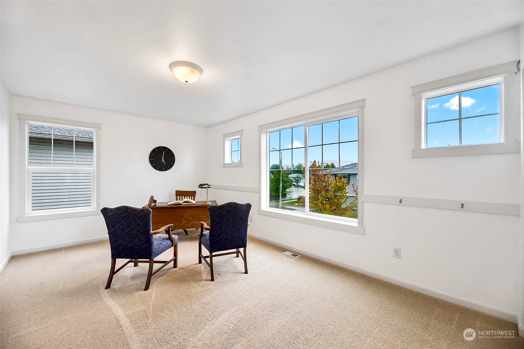 20227 Rustic View Road Southeast Monroe, WA 98272 - Photo 31 of 37 a view of a dining room with furniture and a window