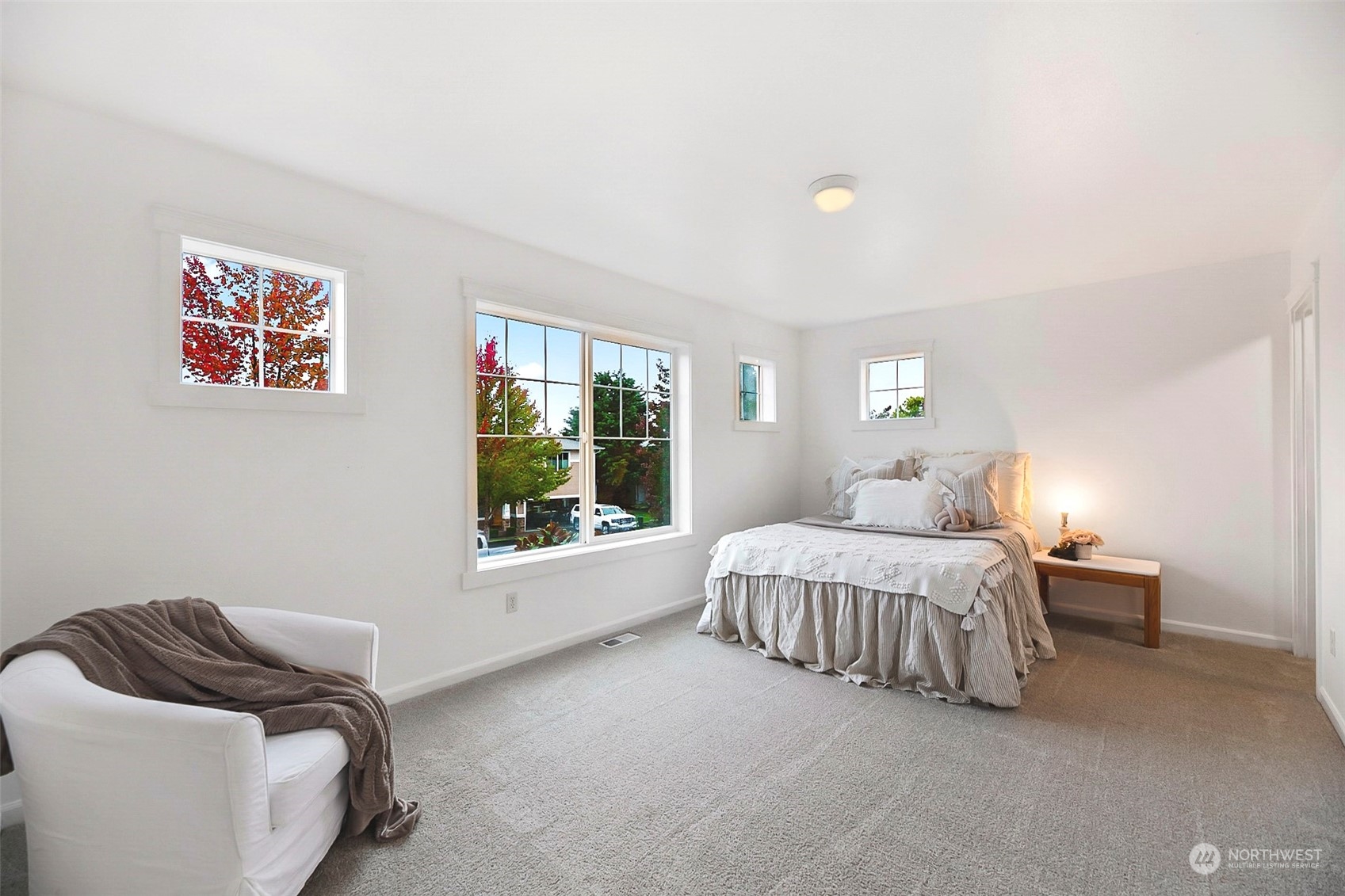 20227 Rustic View Road Southeast Monroe, WA 98272 - Photo 33 of 37 a bedroom with bed and a window