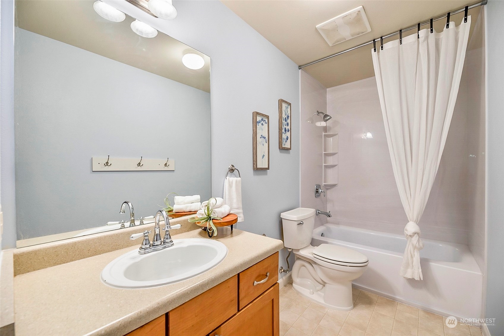 20227 Rustic View Road Southeast Monroe, WA 98272 - Photo 35 of 37 a bathroom with a sink toilet and shower
