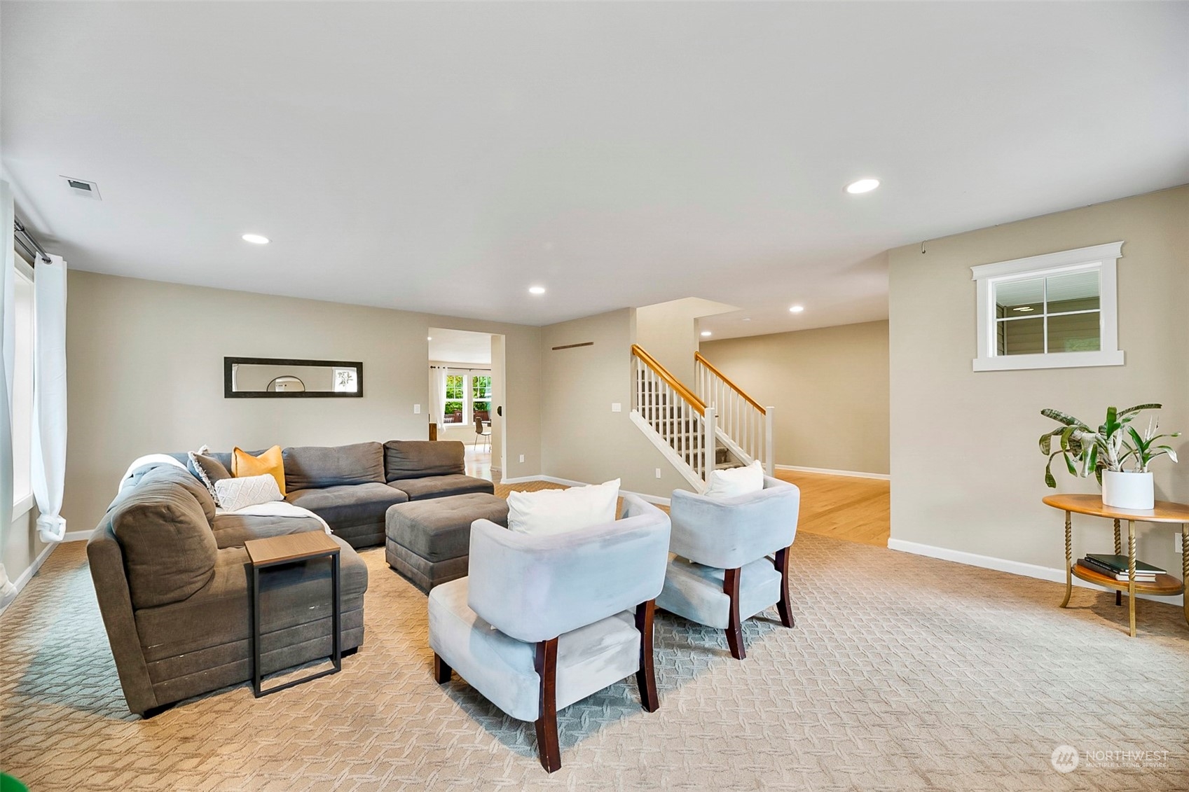20227 Rustic View Road Southeast Monroe, WA 98272 - Photo 6 of 37 a living room with furniture and wooden floor