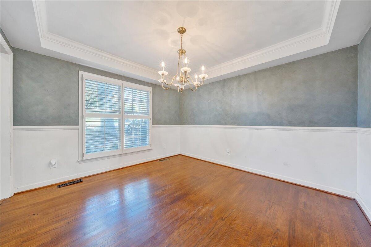 5539 Highfields Road Roanoke, VA 24018 - Photo 12 of 69 a view of an empty room with wooden floor and a window