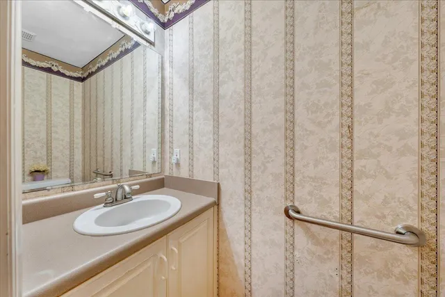 a bathroom with a bathtub a sink a toilet and a bathtub