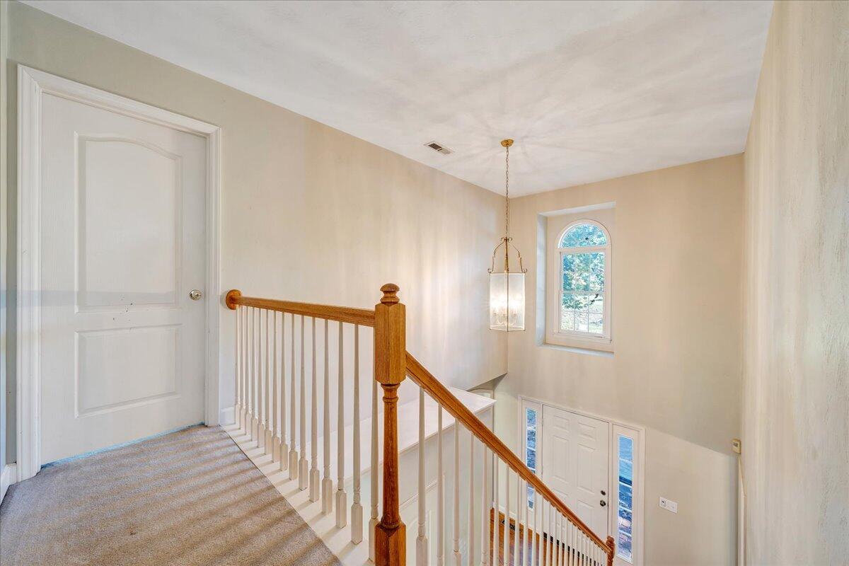 5539 Highfields Road Roanoke, VA 24018 - Photo 32 of 69 a view of a hallway with windows