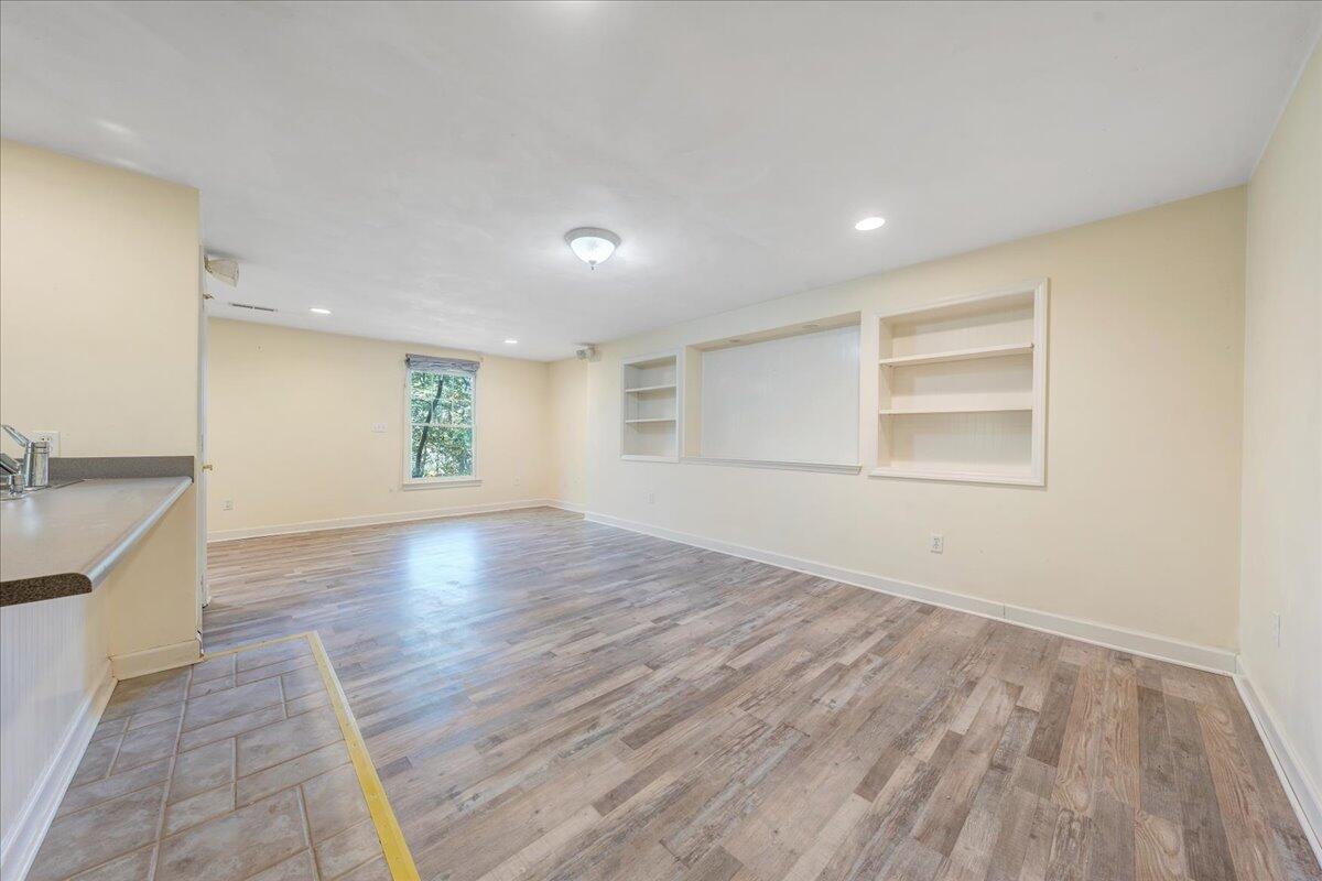 5539 Highfields Road Roanoke, VA 24018 - Photo 54 of 69 a view of empty room with wooden floor and fan
