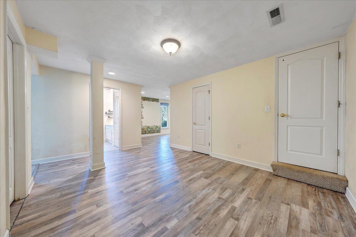 5539 Highfields Road Roanoke, VA 24018 - Photo 58 of 69 a view of an empty room with wooden floor