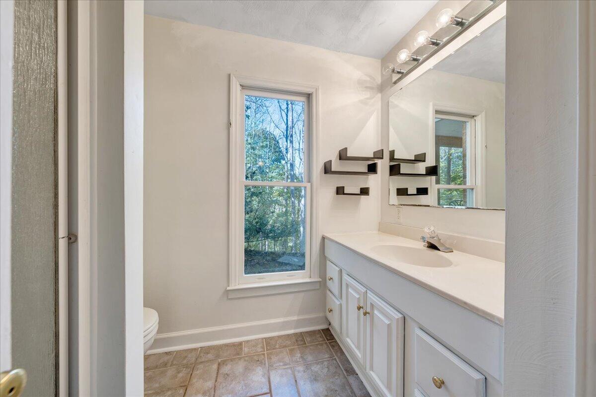 5539 Highfields Road Roanoke, VA 24018 - Photo 63 of 69 a bathroom with a double vanity sink and mirror