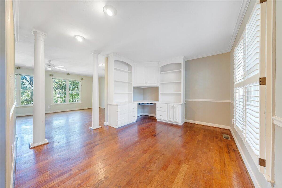 5539 Highfields Road Roanoke, VA 24018 - Photo 7 of 69 a view of an empty room with wooden floor and a window