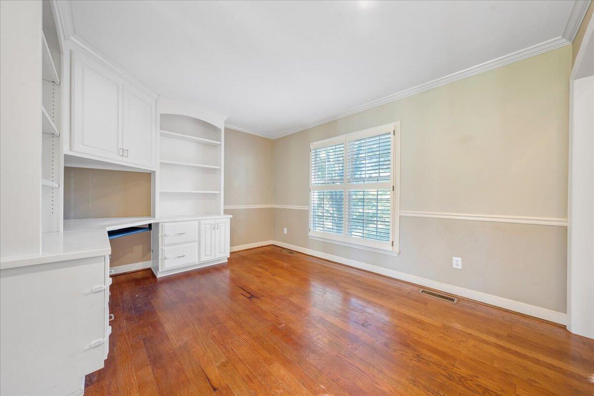 5539 Highfields Road Roanoke, VA 24018 - Photo 8 of 69 an empty room with wooden floor and windows
