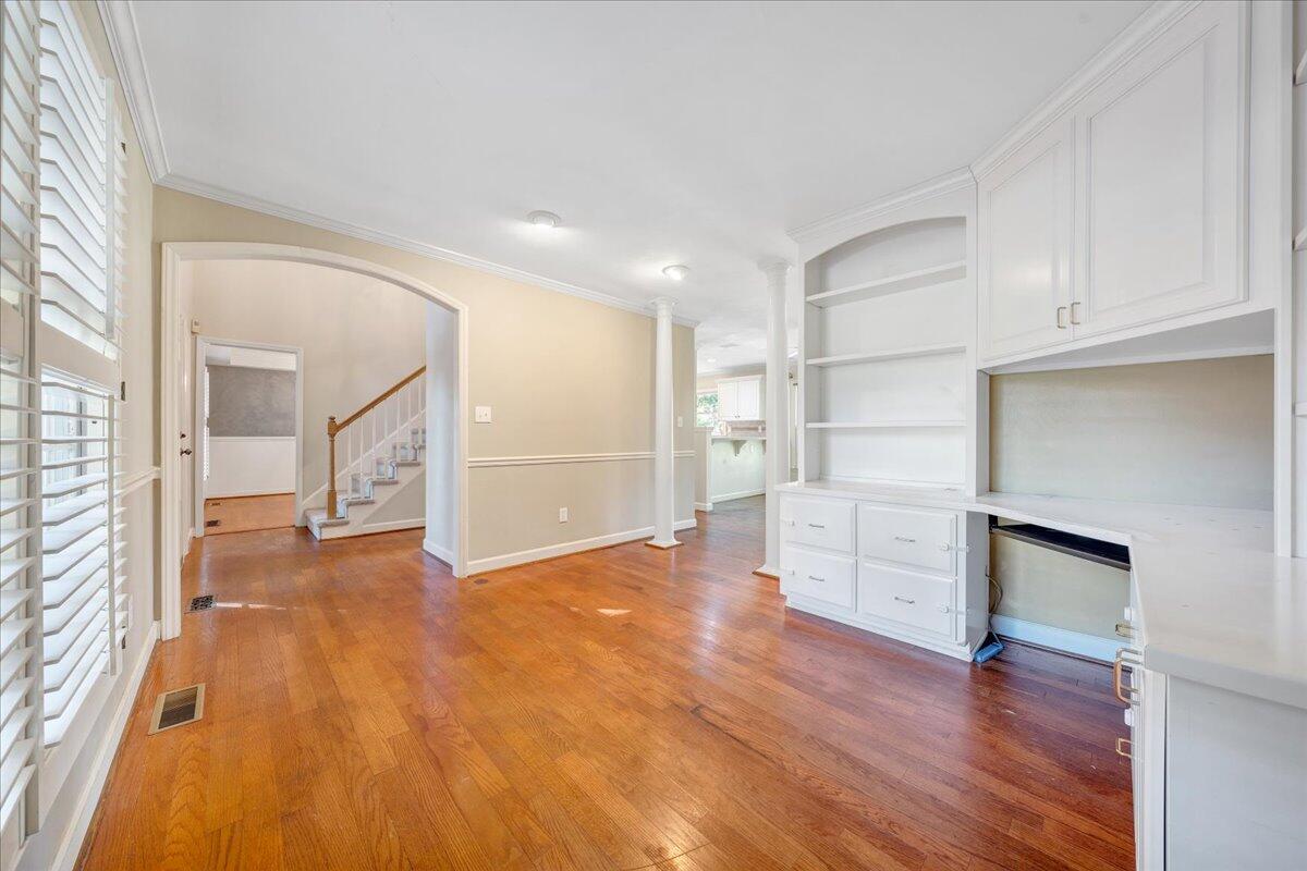5539 Highfields Road Roanoke, VA 24018 - Photo 9 of 69 a view of a big room with wooden floor and windows