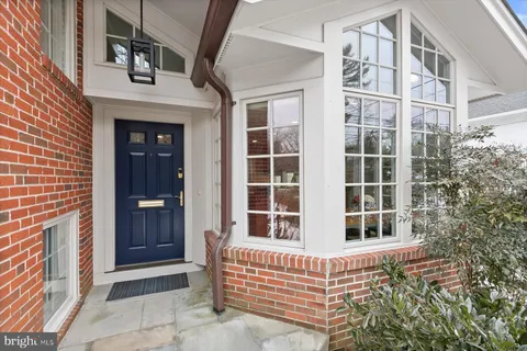 a kitchen with stainless steel appliances granite countertop a stove and a refrigerator