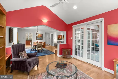 a view of walk in closet with clothes