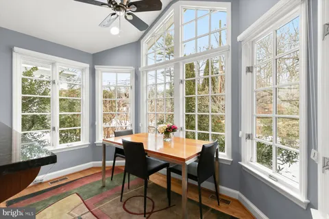 a kitchen with stainless steel appliances granite countertop wooden cabinets stove and sink