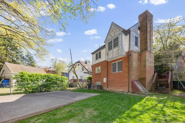 a view of backyard with a garden and plants