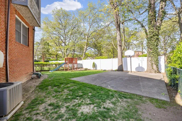 a view of city and green space