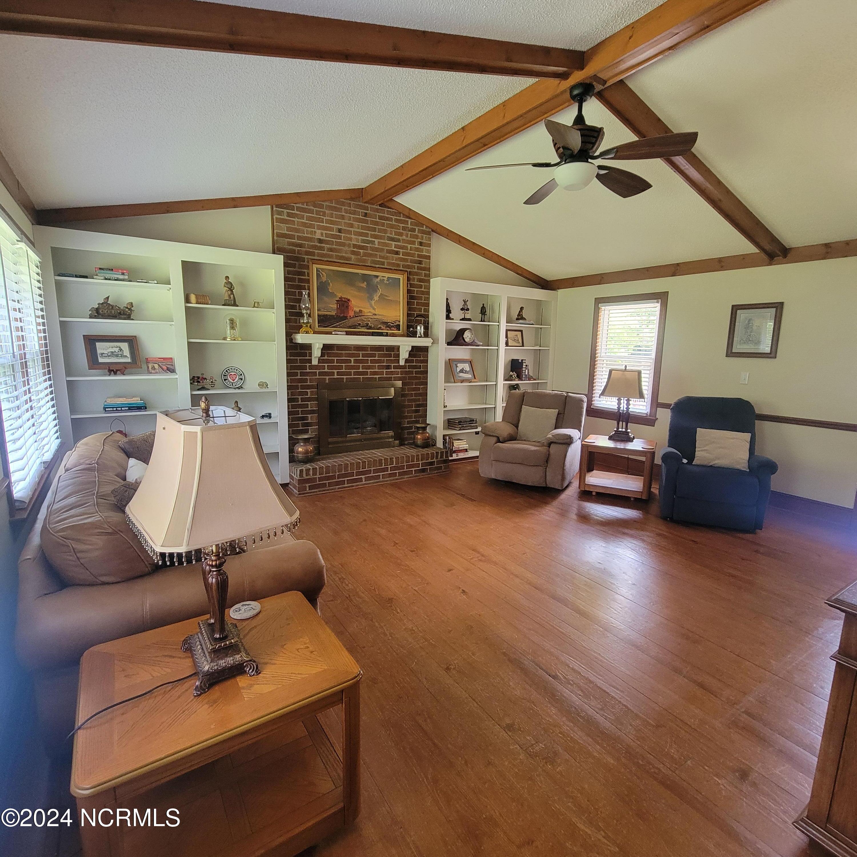 6081 Hoyt Road Middlesex, NC 27557 - Photo 30 of 59 Family.Room.with.Fireplace