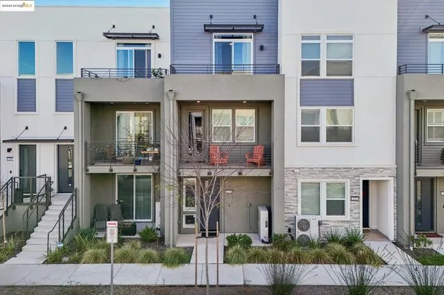a front view of a brick building with a entryway