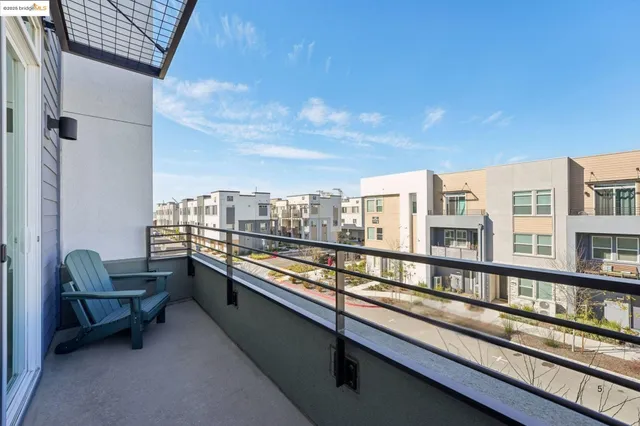 a bathroom with a shower sink and mirror