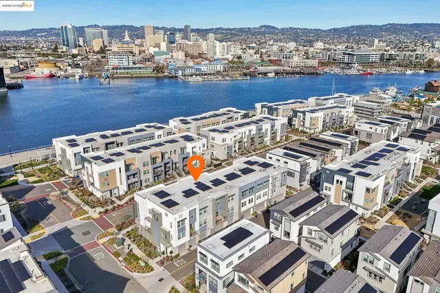 an aerial view of residential building and lake view