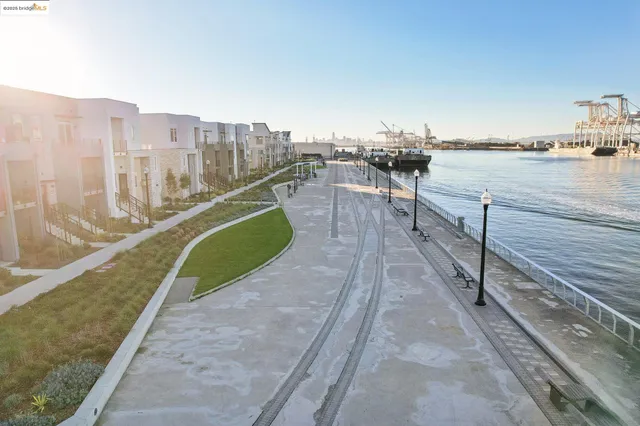 a view of a swimming pool with outdoor seating