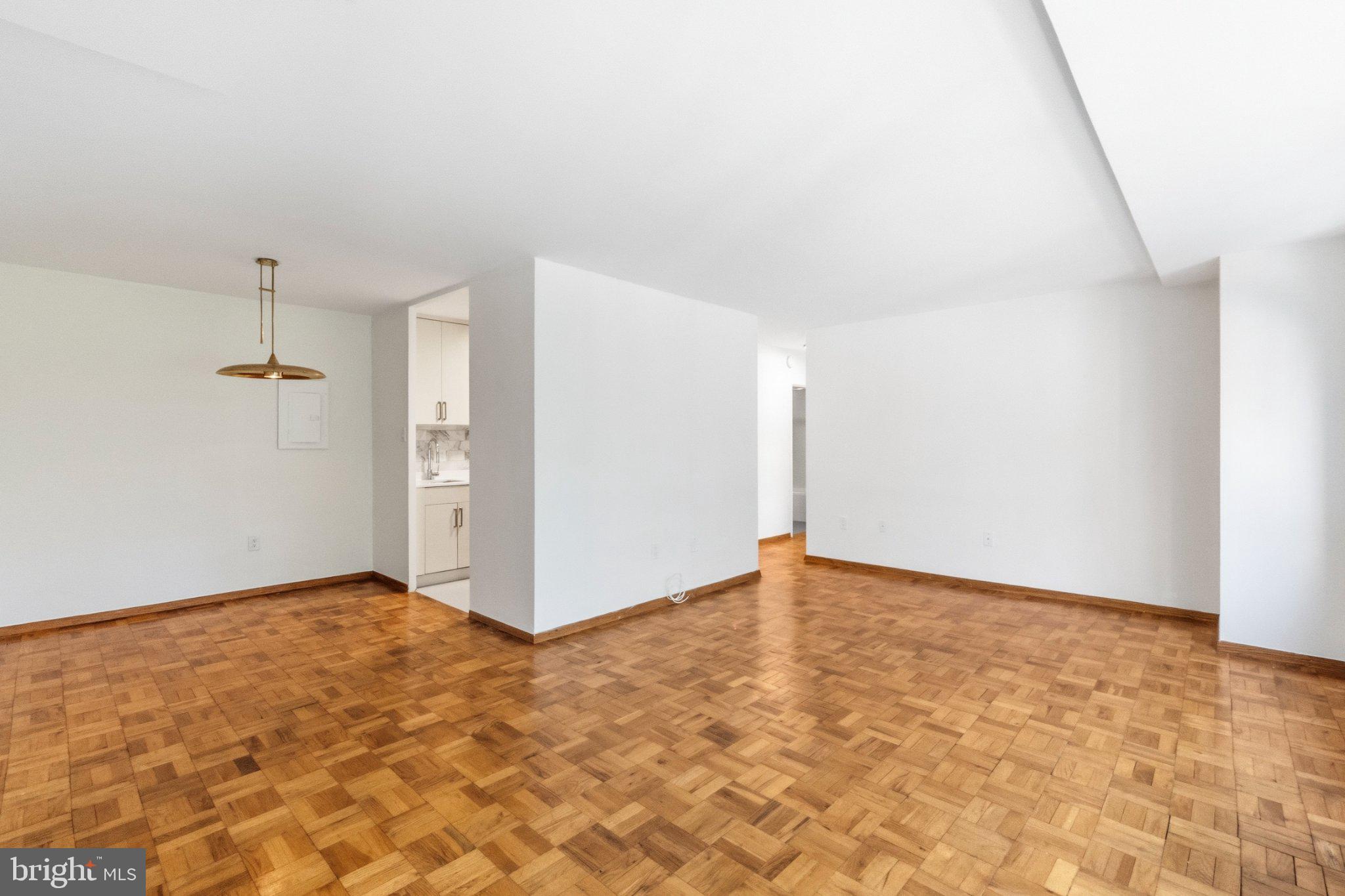 4000 Tunlaw Road Northwest, Unit 923 Washington, DC 20007 - Photo 11 of 32 Living and Dining Space