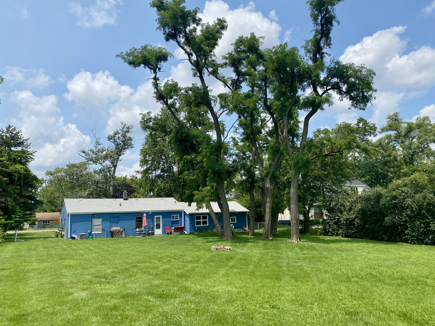 6845 Willow Springs Road Countryside, IL 60525 - Photo 16 of 16 a front view of a house with garden
