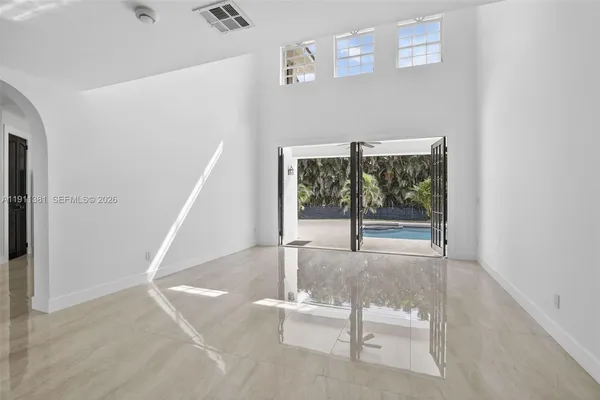 a view of a livingroom with a staircase