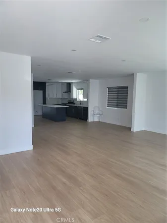 a view of a livingroom and a dishwasher
