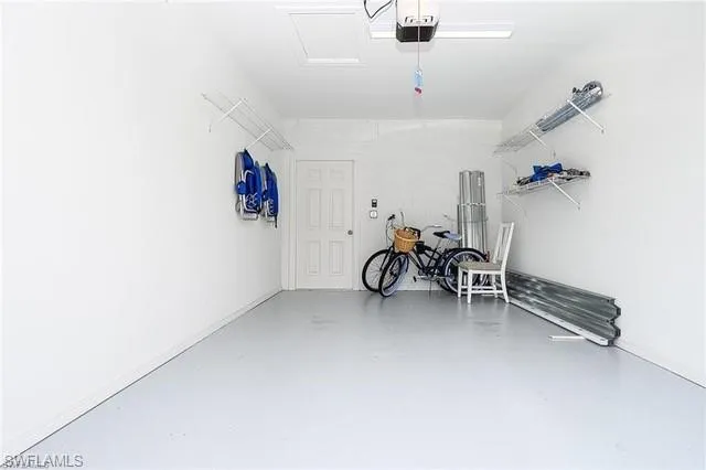 a view of a livingroom with furniture and a ceiling fan