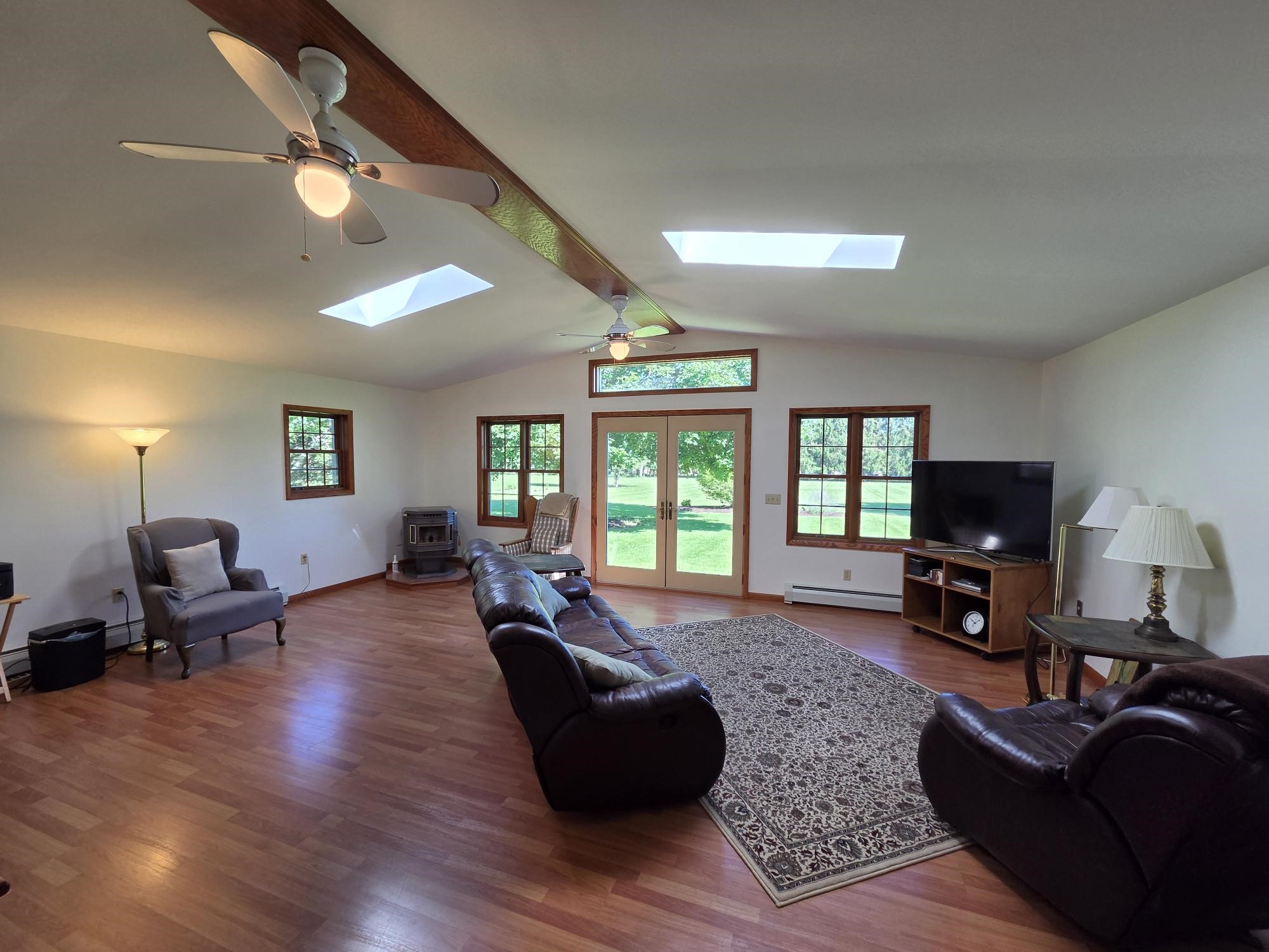 Vaulted Family Room w/Pellet Stove & Skylites