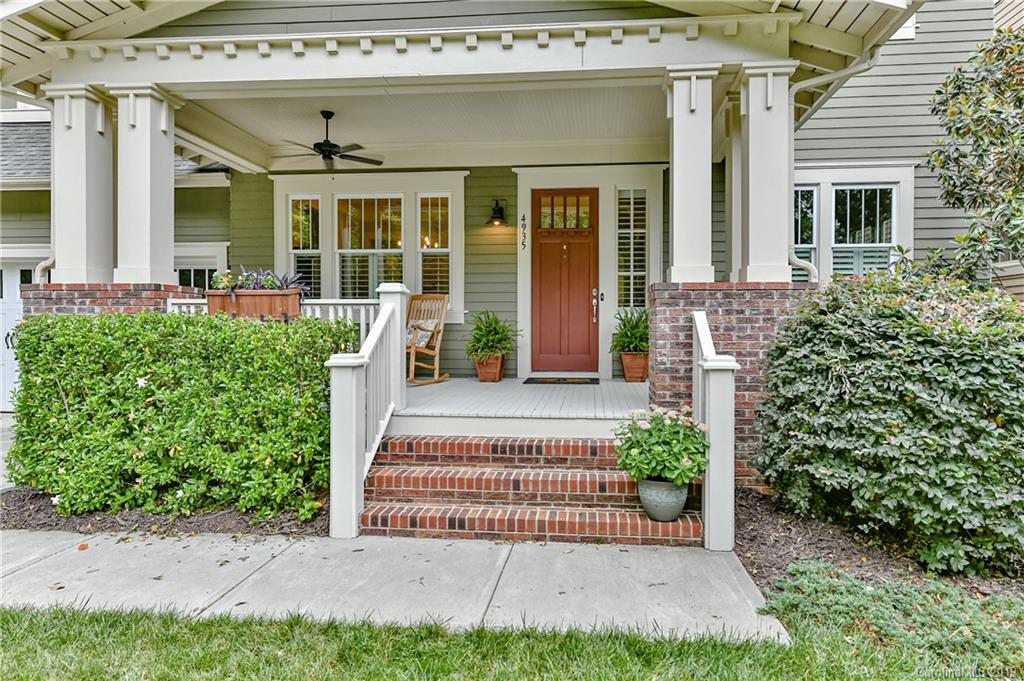 4935 Sharon View Road Charlotte, NC 28226 - Photo 2 of 48 front view of a house with a yard