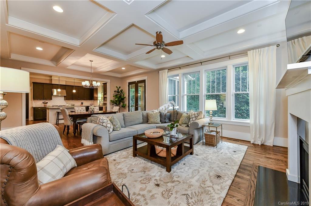 4935 Sharon View Road Charlotte, NC 28226 - Photo 12 of 48 a living room with furniture and a fireplace