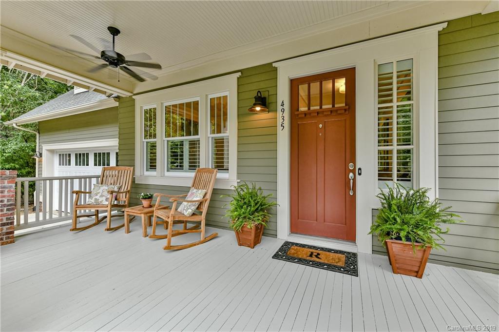 4935 Sharon View Road Charlotte, NC 28226 - Photo 3 of 48 a balcony with furniture and potted plants