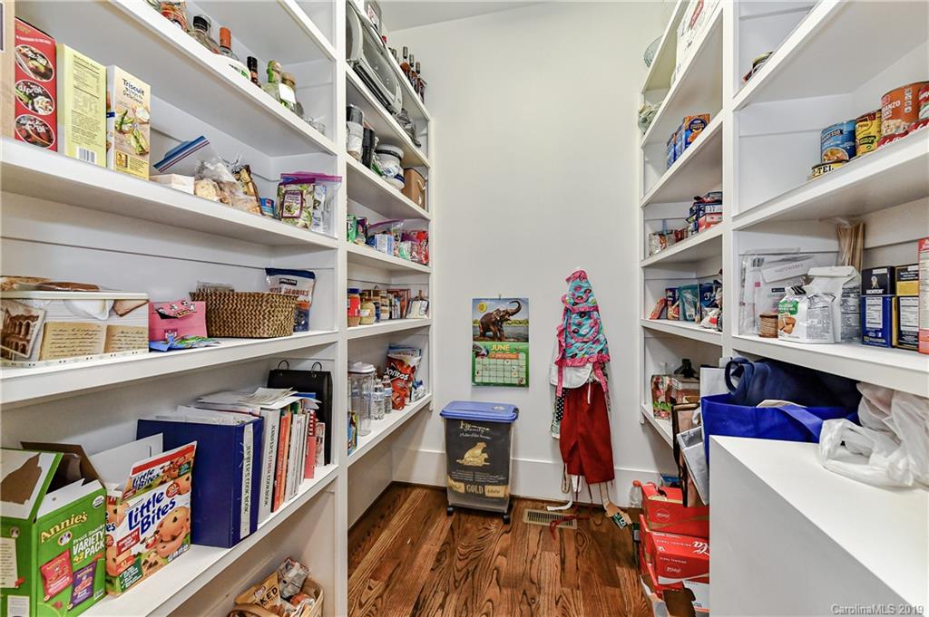 4935 Sharon View Road Charlotte, NC 28226 - Photo 22 of 48 a view of walk in closet with clothes and shoes