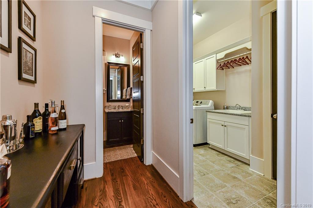 4935 Sharon View Road Charlotte, NC 28226 - Photo 27 of 48 a kitchen with a refrigerator and a stove top oven