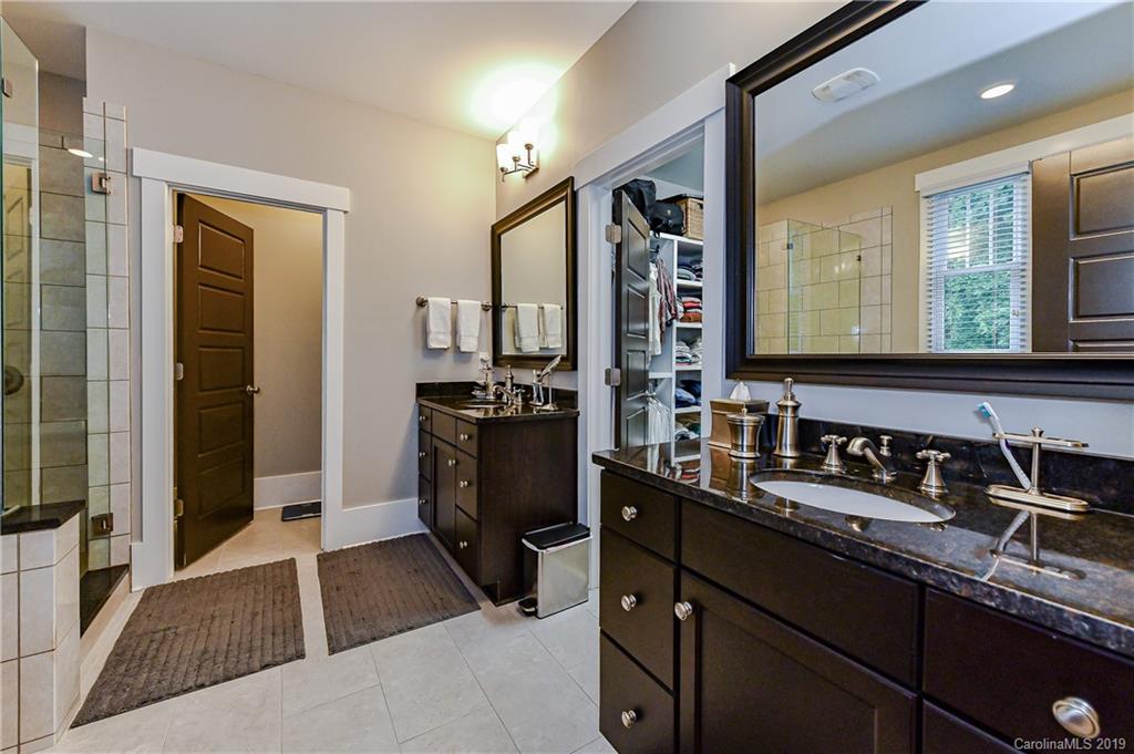 4935 Sharon View Road Charlotte, NC 28226 - Photo 33 of 48 a kitchen with a sink and refrigerator