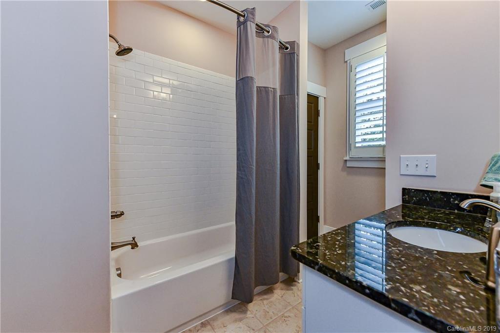 4935 Sharon View Road Charlotte, NC 28226 - Photo 37 of 48 a bathroom with a granite countertop sink and a mirror